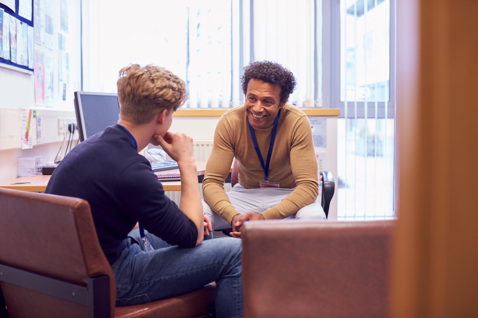 two people speaking together