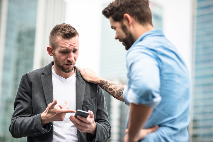 Two men looking after each other.